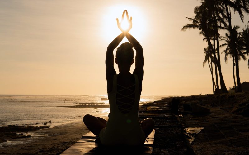 beautiful-woman-meditating-outdoors